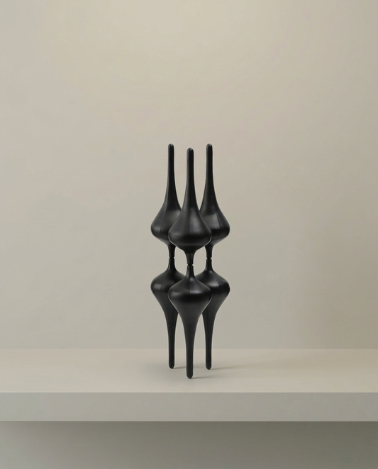 Black Spire Sculpture, front view on neutral background