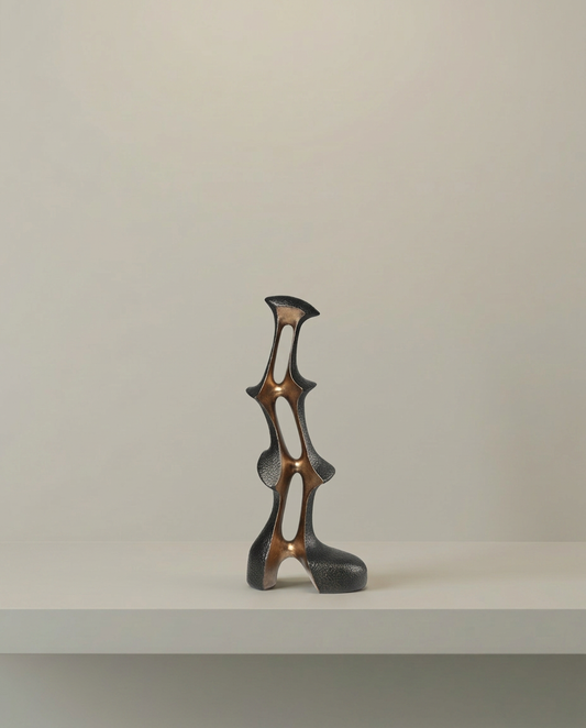 Bronze Tier Sculpture, front view on neutral background