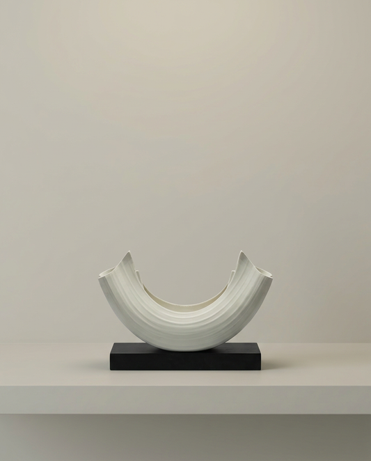 Ribbed Arc Sculpture, front view on neutral background