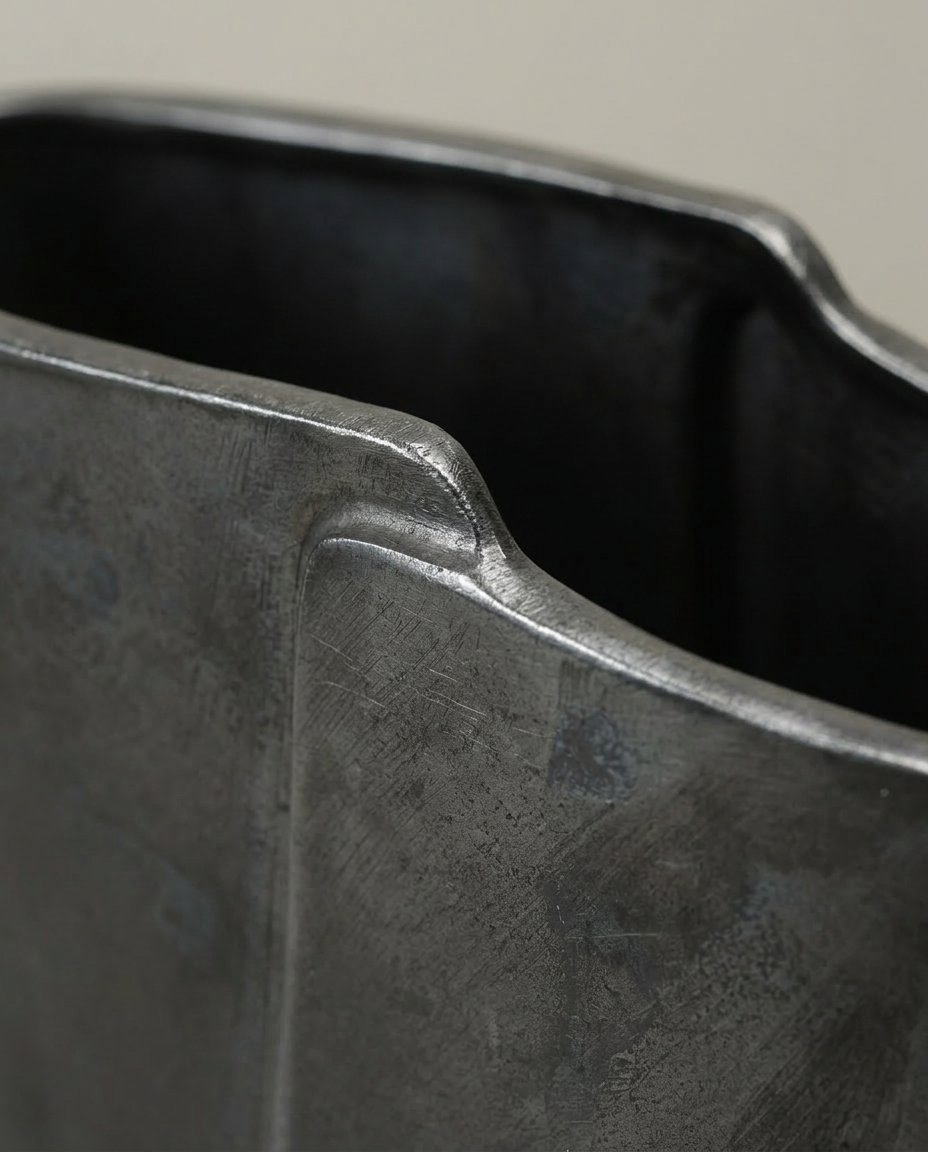 Angled Pour Vessel, close-up detail showing texture and material