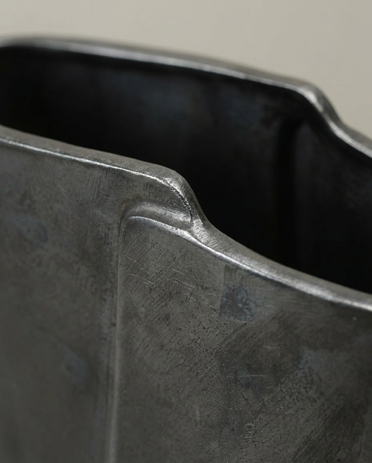 Angled Pour Vessel, close-up detail showing texture and material