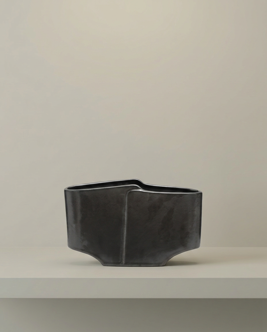 Angled Pour Vessel, front view on neutral background
