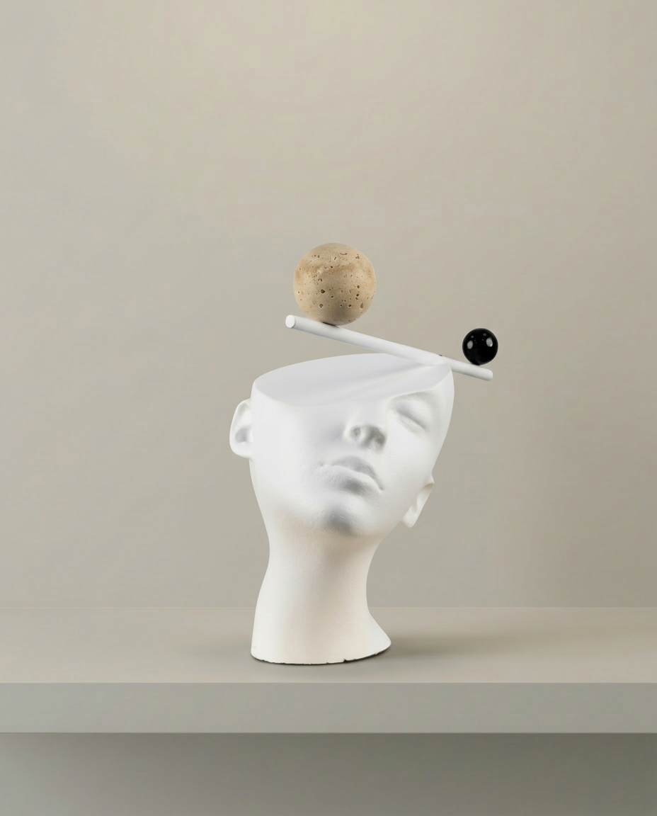 Balance Head Sculpture, front view on neutral background