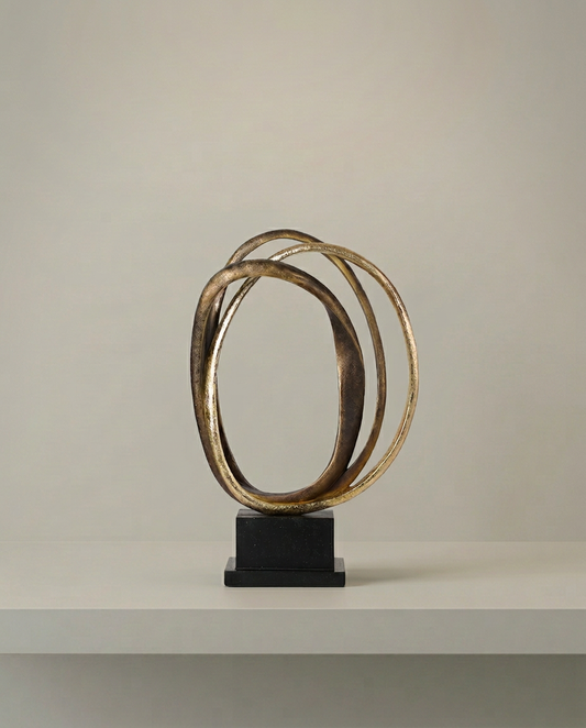 Brass Ring Sculpture, front view on neutral background