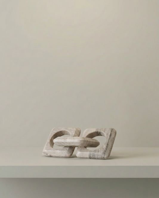 Chain Link Marble Ornament, front view on neutral background