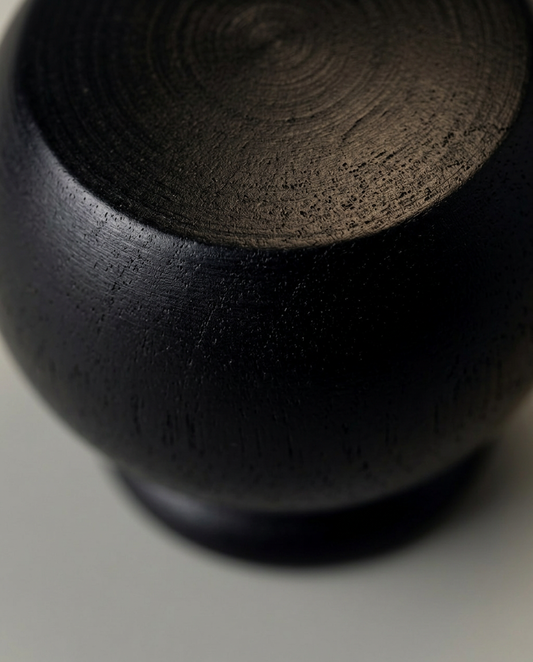 Dark Orb Sculpture, close-up detail showing texture and material