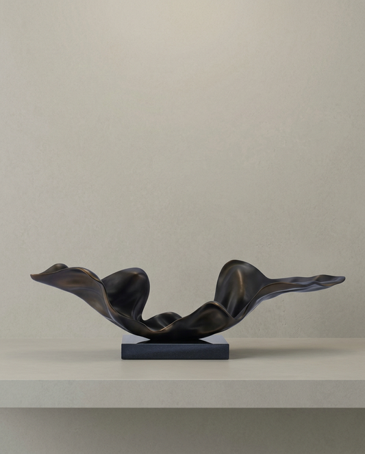 Dark Wing Sculpture, front view on neutral background