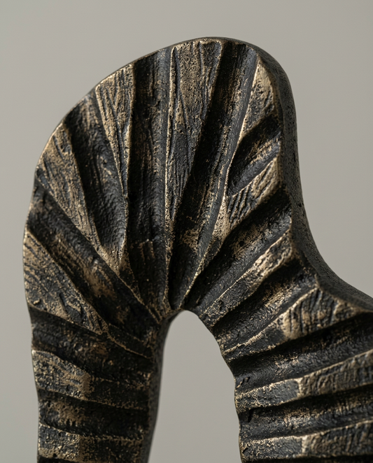 Fluid Bronze Sculpture, close-up detail showing texture and material