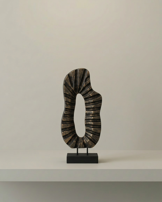 Fluid Bronze Sculpture, front view on neutral background