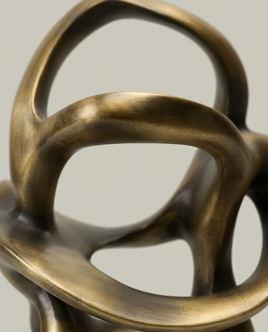 Gold Ribbon Sculpture, close-up detail showing texture and material