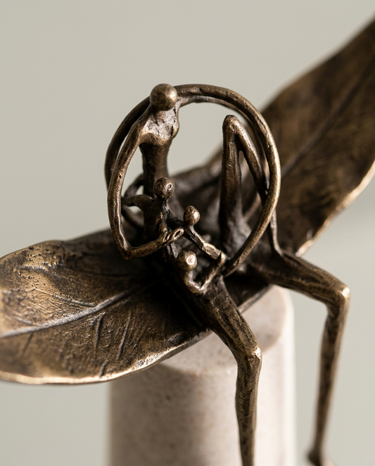 Leaf and Figures Sculpture, close-up detail showing texture and material