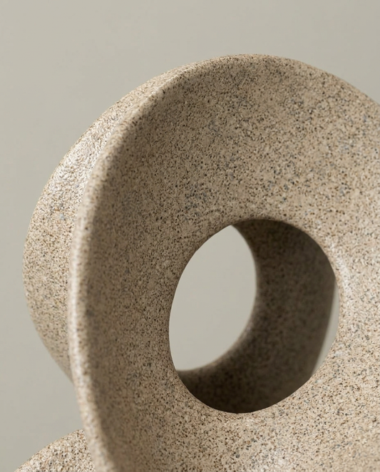 Looped Stone Sculpture, close-up detail showing texture and material