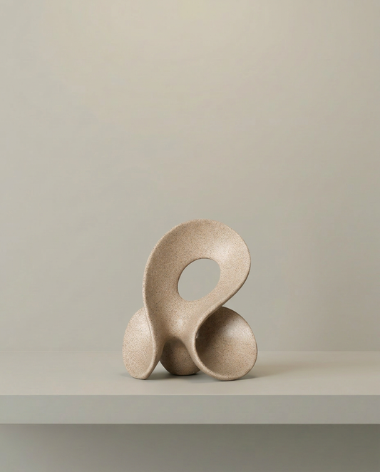 Looped Stone Sculpture, front view on neutral background