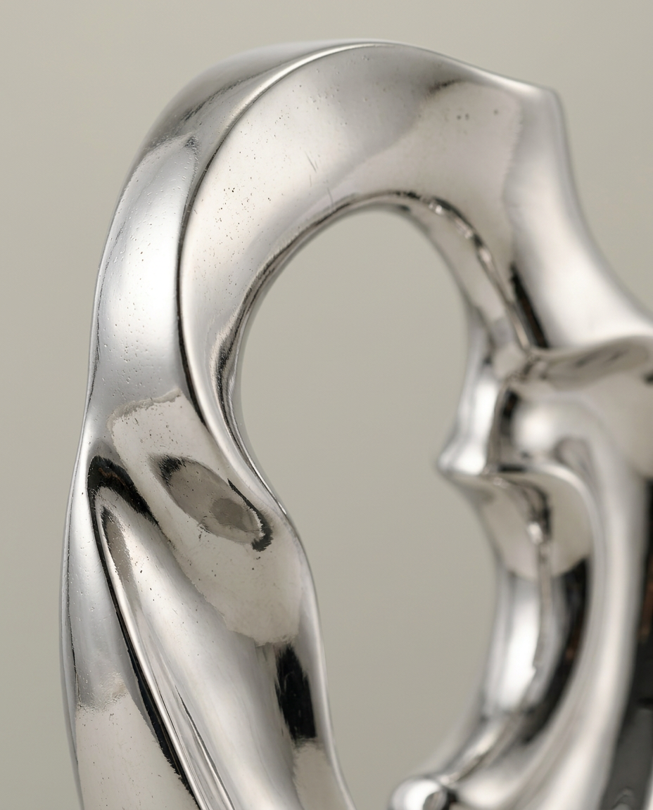 Mirror Loop Sculpture, close-up detail showing texture and material