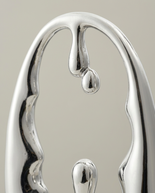 Mirror Oval Sculpture, close-up detail showing texture and material