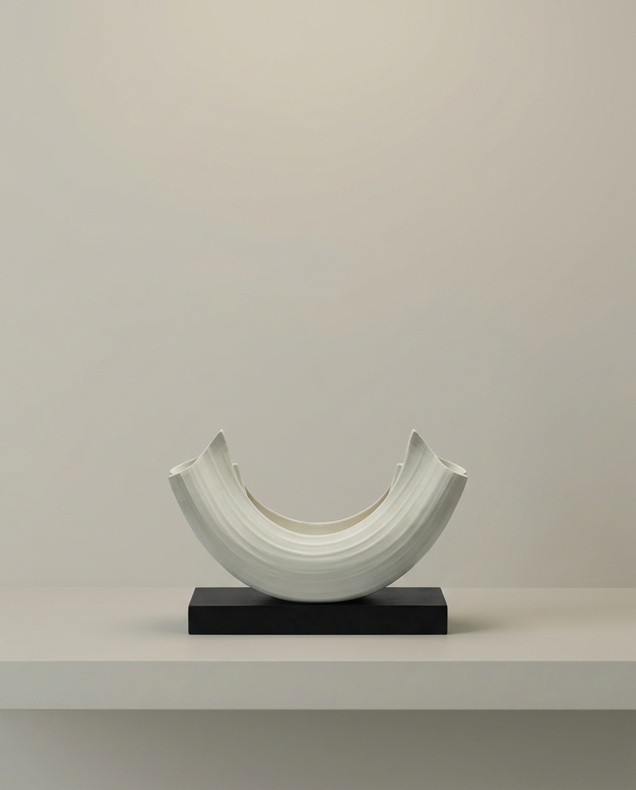 Ribbed Arc Sculpture, front view on neutral background