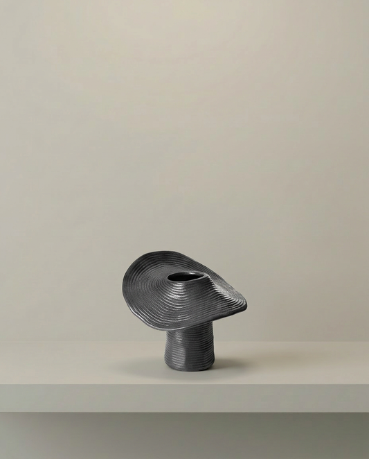 Ribbed Swirl Vase, front view on neutral background