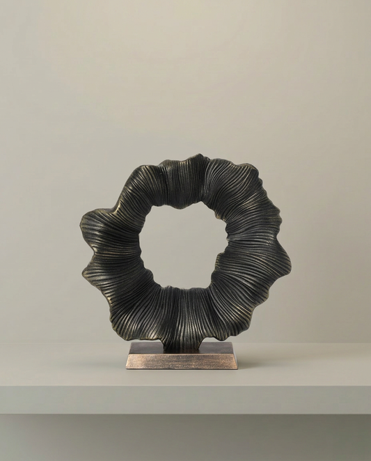 Ribbed Wreath Sculpture, front view on neutral background