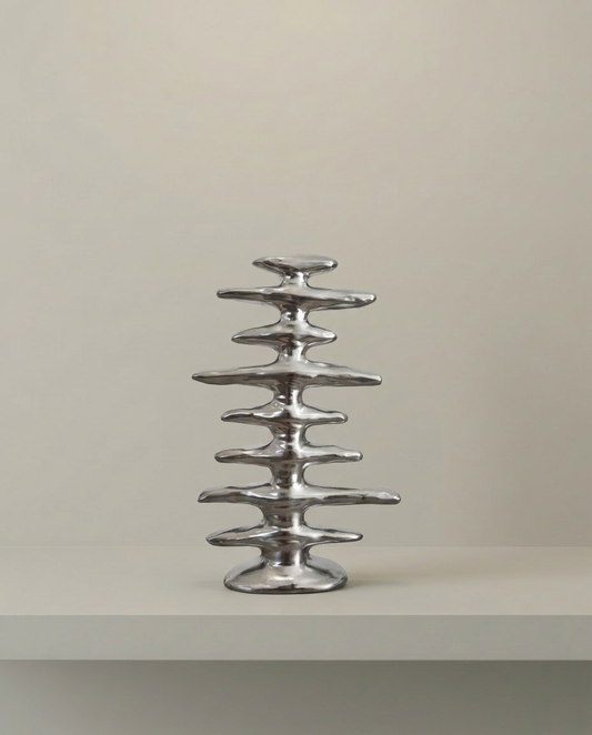 Stacked Disc Sculpture, Silver, front view on neutral background
