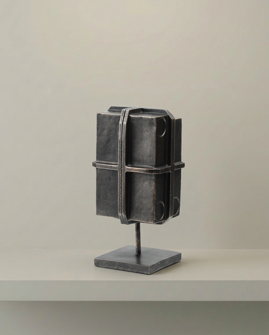 Strapped Block Sculpture, front view on neutral background