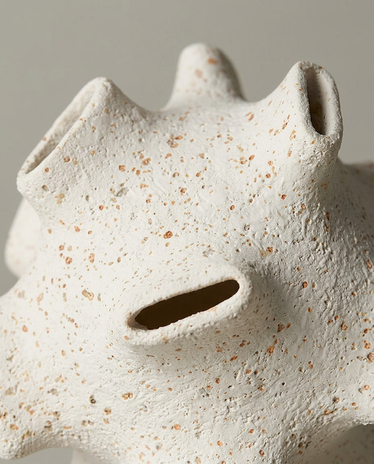 Textured Stone Sculpture, close-up detail showing texture and material