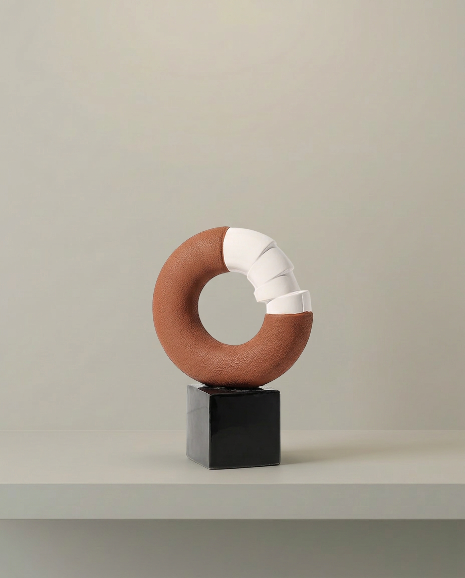 Two-Tone Ring Sculpture, front view on neutral background