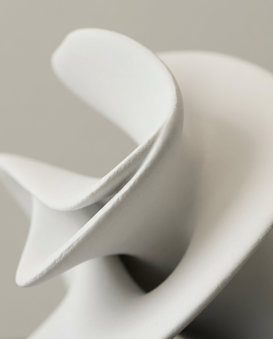 White Resin Geometric Sculpture, close-up detail showing texture and material