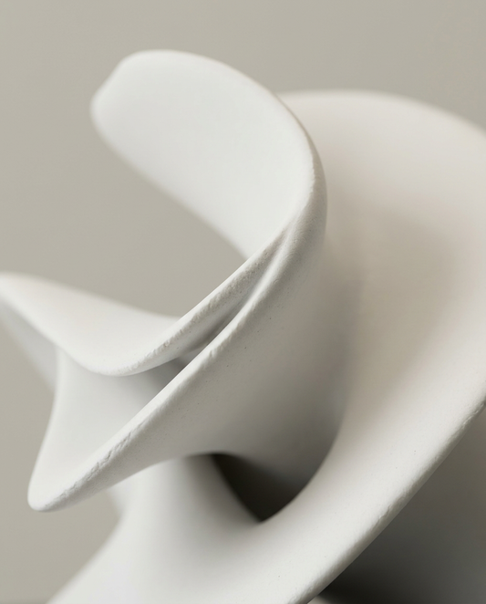 White Resin Geometric Sculpture, close-up detail showing texture and material