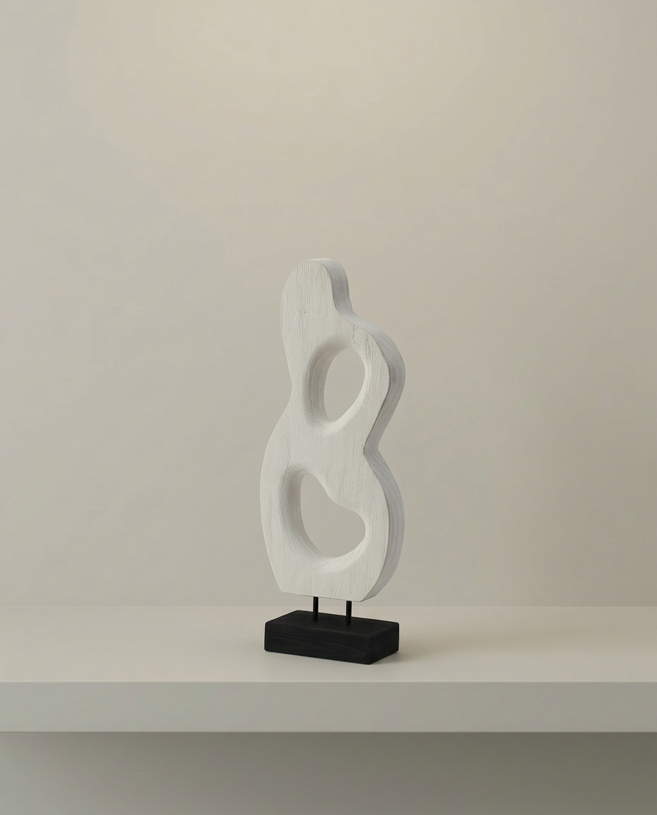 Whitewashed Loop Sculpture, front view on neutral background