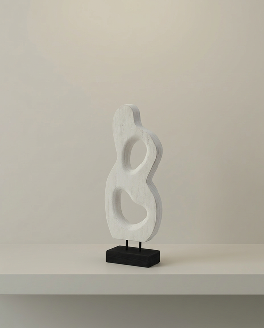 Whitewashed Loop Sculpture, front view on neutral background