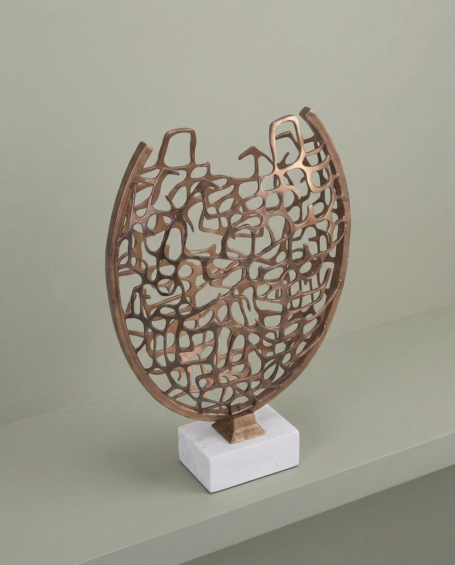 Woven Gold Sculpture on Marble Base, elevated angle view